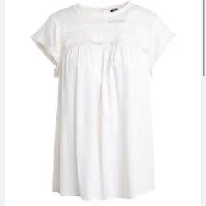 Daniel Rainn white top